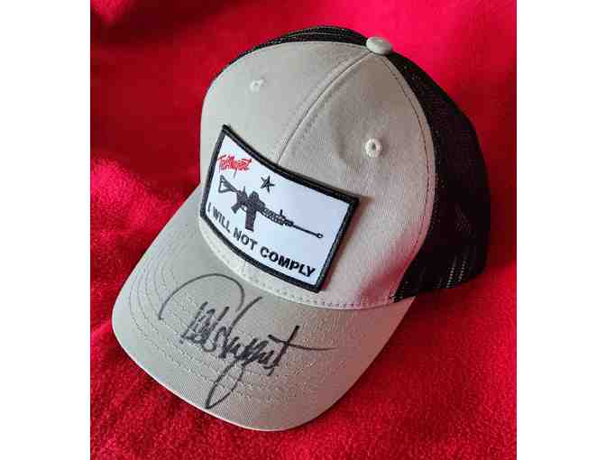 Ted Nugent signed hat, photo and two arrows