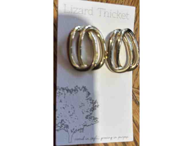 Candle and Jewelry from the Lizard Thicket Boutique, Peachtree City.